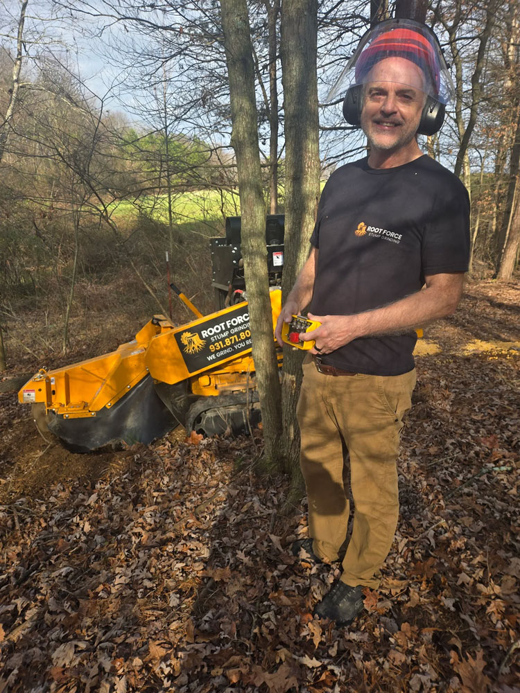 Kurt Dommermuth, founder of Tree Service Software, stump grinding with a Carlton 6016 for Root Force Stump Grinding.